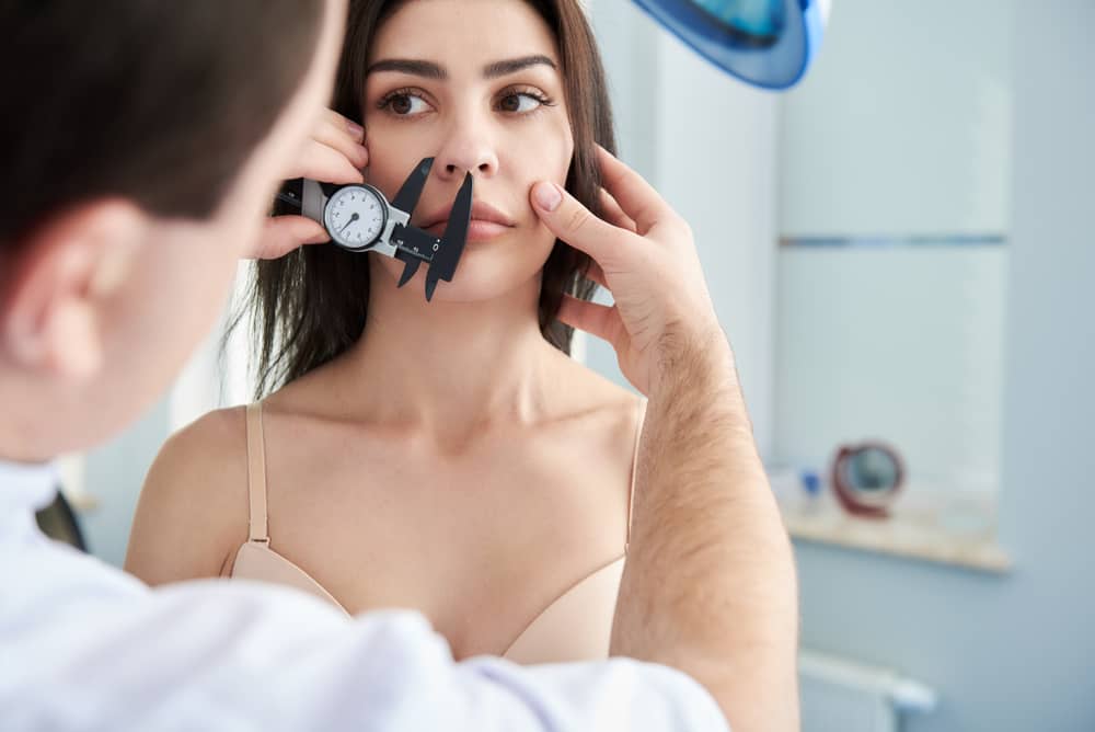 During a rhinoplasty consultation, your surgeon will discuss your goals and assess the structure of your nose to determine if surgery is appropriate